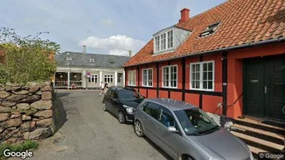 Boligudlejningsejendomme til salg i Svaneke - Foto fra Google Street View