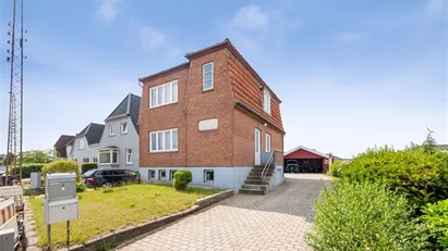 Velholdt boligudlejningsejendom med to lejemål