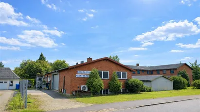 SELVSTÆNDIG LAGEREJENDOM MED EGEN GRUND OG PORT